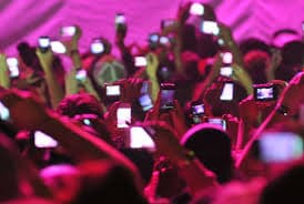 People viewing life through phone screens